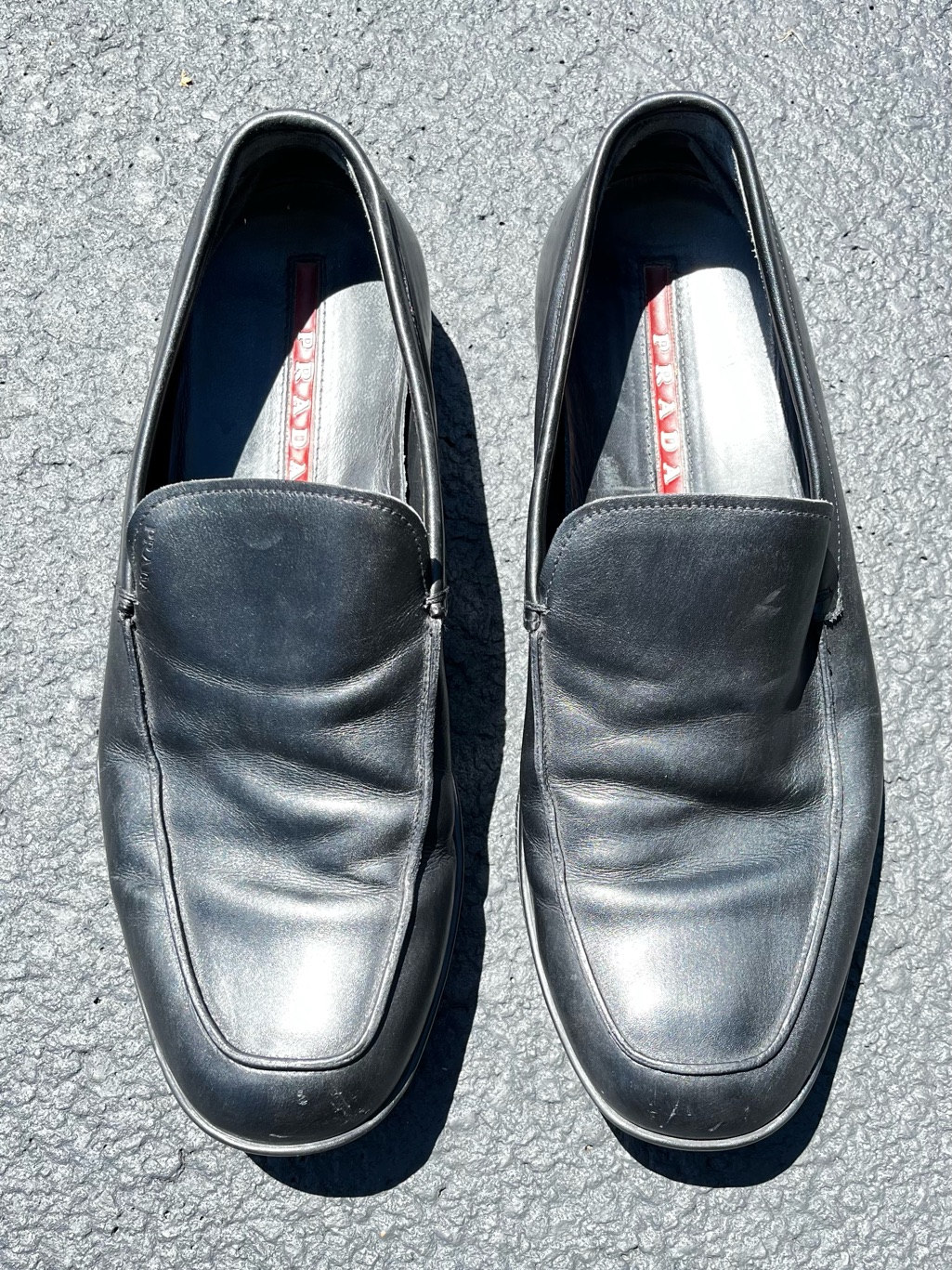 Prada Linea Rossa Black Leather Loafers Classic Slip-On Design Round Toes 7.5m
